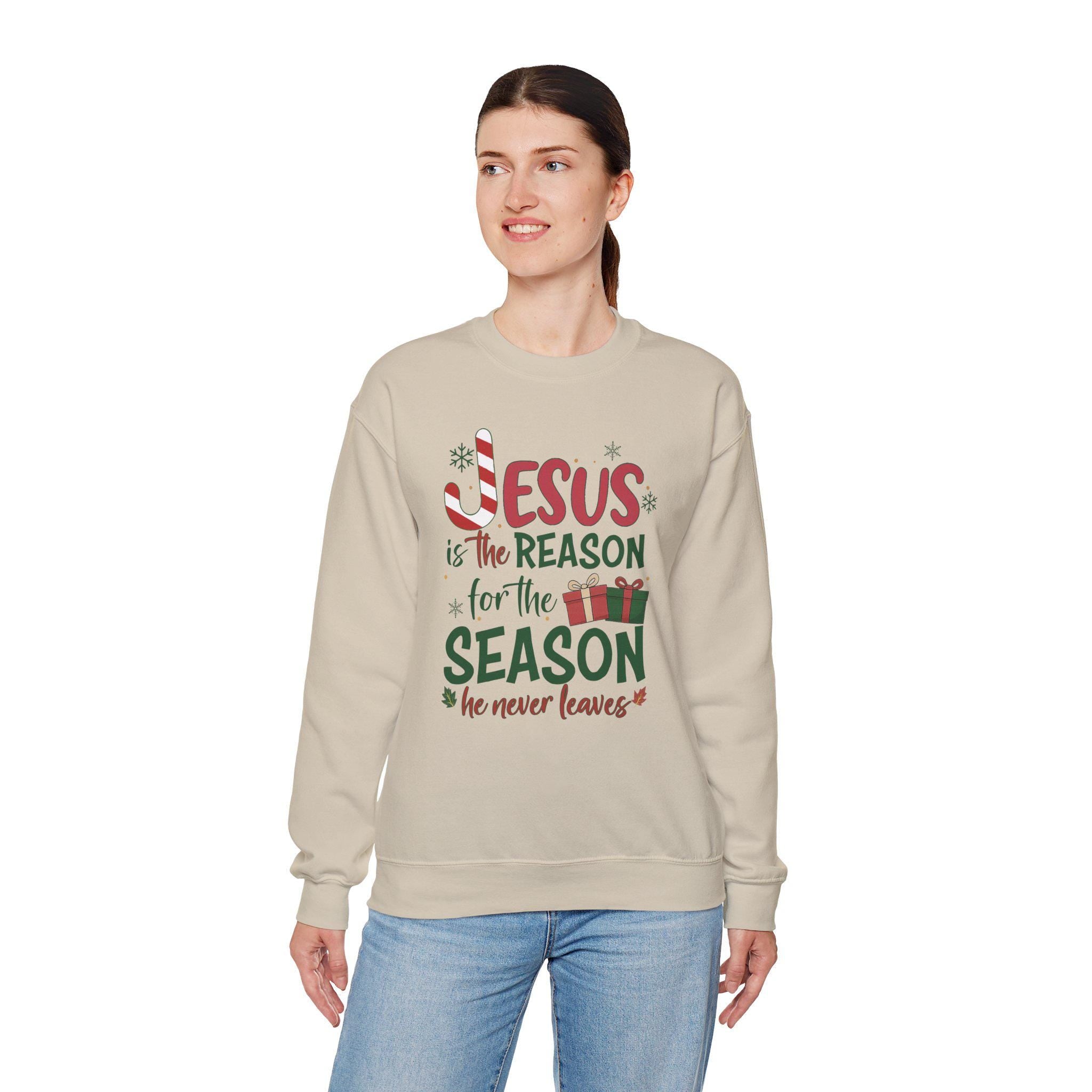 Jesus Is The Reason For The Season He Never Leaves | Christian Christmas Sweatshirt | Redeemed Faith Apparel | Christmas Collection Crewneck
