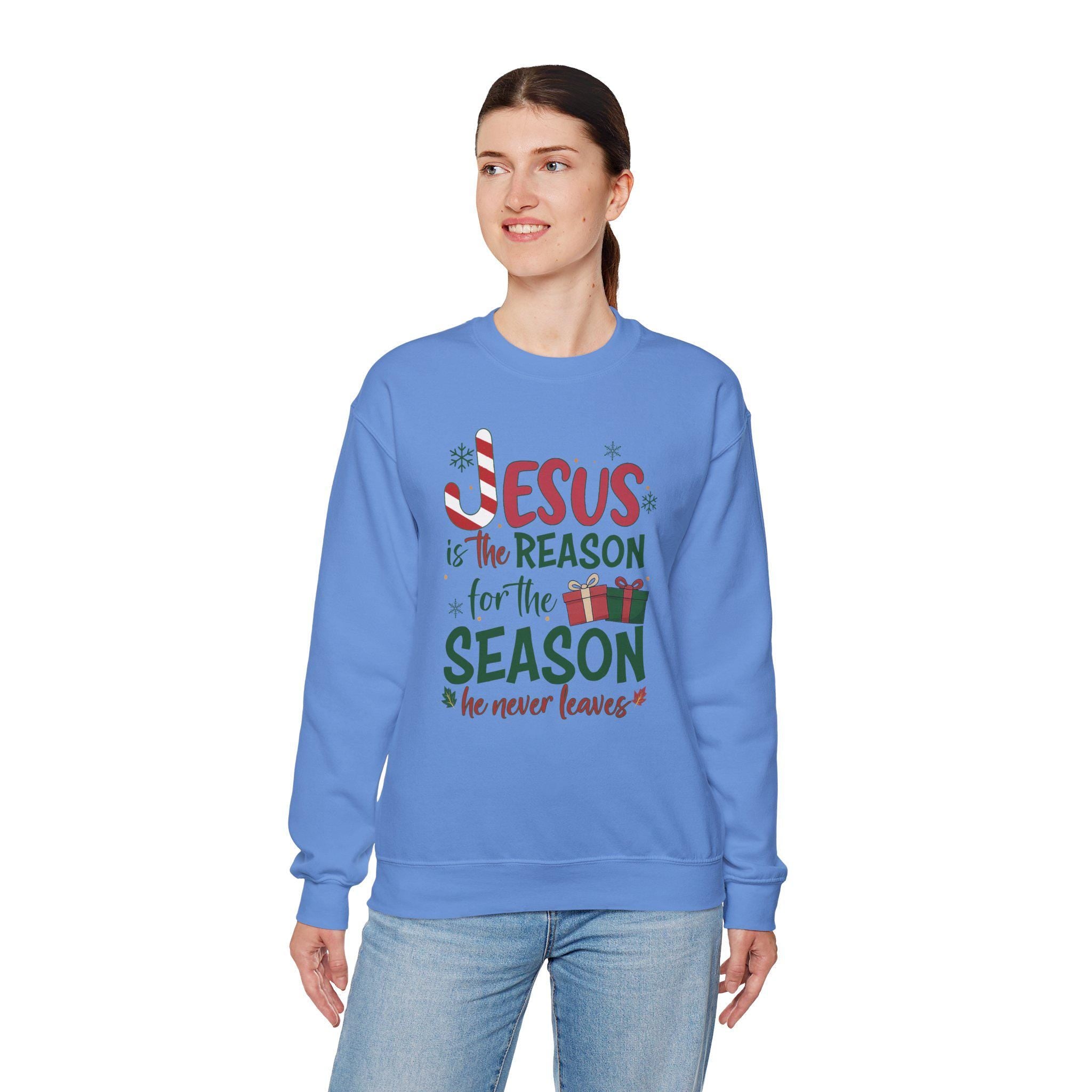 Jesus Is The Reason For The Season He Never Leaves | Christian Christmas Sweatshirt | Redeemed Faith Apparel | Christmas Collection Crewneck