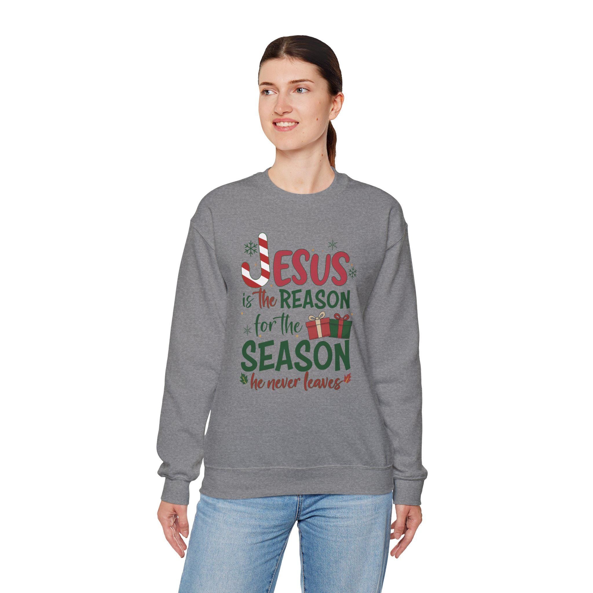 Jesus Is The Reason For The Season He Never Leaves | Christian Christmas Sweatshirt | Redeemed Faith Apparel | Christmas Collection Crewneck